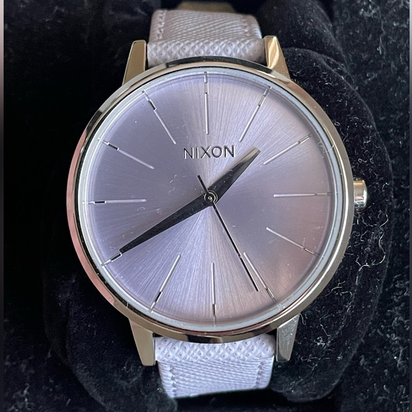 Nixon women’s Kensington watch with a lavender leather band. Brand new with box.